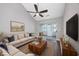 Comfortable living room with stylish furnishings, neutral tones, and sliding glass doors at 612 Intracoastal Way Dr. # 103, Myrtle Beach, SC 29579