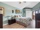 Relaxing bedroom featuring tropical decorations, wooden furniture and access to a patio at 614 14Th Ave. S # 47, Surfside Beach, SC 29575