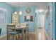 Bright dining room featuring a dining table with 4 chairs and coastal decor at 614 14Th Ave. S # 47, Surfside Beach, SC 29575