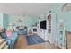 Bright living room with cozy seating, a fireplace, and beachy decor at 614 14Th Ave. S # 47, Surfside Beach, SC 29575