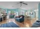 Open living room with dining area and slider door access to private yard at 614 14Th Ave. S # 47, Surfside Beach, SC 29575