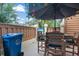 Outdoor patio features an umbrella-covered table set, creating a perfect spot for relaxation and dining at 614 14Th Ave. S # 47, Surfside Beach, SC 29575