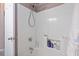 Bright white tiled shower with shower head, faucet, and plenty of room to store bath supplies at 614 14Th Ave. S # 47, Surfside Beach, SC 29575
