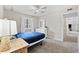 Serene bedroom featuring plush carpet, ample natural light, and a ceiling fan at 615 Carter Ln. # D6, Conway, SC 29526