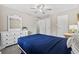 Comfortable bedroom features neutral colors, ceiling fan, carpet, and ample natural light at 615 Carter Ln. # D6, Conway, SC 29526