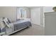 Bedroom featuring a window, plush carpet and a double-door closet for storage at 615 Carter Ln. # D6, Conway, SC 29526