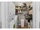 Convenient laundry area with washer, dryer, and shelving for optimal storage at 615 Carter Ln. # D6, Conway, SC 29526