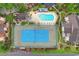 Aerial view of a tennis court and a swimming pool in a condo complex at 620 15Th Ave. S # 87, Surfside Beach, SC 29575
