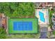An aerial shot of a tennis court and a swimming pool at 620 15Th Ave. S # 87, Surfside Beach, SC 29575