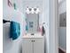 Well-lit bathroom with a vanity and a mirror, offering a clean and functional space at 620 15Th Ave. S # 87, Surfside Beach, SC 29575