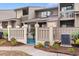 Exterior view of townhome featuring private fenced patio, meticulous landscaping, and a modern AC unit for enhanced comfort at 620 15Th Ave. S # 87, Surfside Beach, SC 29575