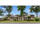 Inviting townhomes with manicured lawns, mature trees, and charming fenced patios, offering a cozy and private outdoor space at 620 15Th Ave. S # 87, Surfside Beach, SC 29575