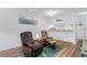 Inviting living room featuring stylish seating, modern decor, hardwood floors, and an open layout, ideal for relaxation and entertaining at 620 15Th Ave. S # 87, Surfside Beach, SC 29575
