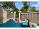 Private outdoor patio area with charming decor and ample space for relaxation and outdoor enjoyment at 620 15Th Ave. S # 87, Surfside Beach, SC 29575