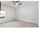 Bedroom with carpet floors, a ceiling fan, and large window at 628 Mccorkle Place, Conway, SC 29526