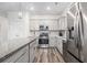 Modern kitchen featuring stainless appliances, ample counter space, and an island at 628 Mccorkle Place, Conway, SC 29526