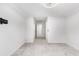 A spacious room with gray carpet and an open door to a different area at 628 Mccorkle Place, Conway, SC 29526