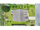 Enjoy the neighborhood with this aerial view of the back of the house with patio and well-manicured landscaping at 698 Lafayette Park Dr., Little River, SC 29566