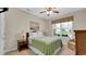 Bedroom featuring a ceiling fan, window with blinds, and decoratively adorned walls at 698 Lafayette Park Dr., Little River, SC 29566
