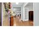 Open foyer with hardwood floors flowing into the spacious living areas at 698 Lafayette Park Dr., Little River, SC 29566