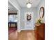 Entryway with hardwood floors, leading to an office and other rooms at 698 Lafayette Park Dr., Little River, SC 29566