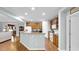 Bright kitchen with a breakfast bar, modern appliances, and hardwood floors at 698 Lafayette Park Dr., Little River, SC 29566