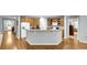 Open kitchen with an island, granite countertops, and stainless appliances at 698 Lafayette Park Dr., Little River, SC 29566