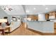 Spacious living and kitchen with hardwood floors and an open floorplan at 698 Lafayette Park Dr., Little River, SC 29566