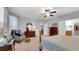 Large main bedroom boasts carpet, natural light, and a ceiling fan at 698 Lafayette Park Dr., Little River, SC 29566