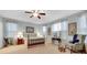 Main bedroom offers carpet, ceiling fan, and lots of natural light at 698 Lafayette Park Dr., Little River, SC 29566