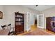 Office space with hardwood floors, custom bookcase, and glass doors at 698 Lafayette Park Dr., Little River, SC 29566