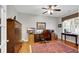 Cozy home office with rich hardwood floors and a ceiling fan at 698 Lafayette Park Dr., Little River, SC 29566