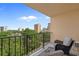 This balcony has outdoor seating and a view of the beach and trees at 7601 N Ocean Blvd. # 7-C, Myrtle Beach, SC 29572