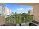 This balcony has seating and a view of the beach and surrounding buildings at 7601 N Ocean Blvd. # 7-C, Myrtle Beach, SC 29572