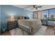 A primary bedroom suite with a large bed, stylish furnishings, and natural light at 7601 N Ocean Blvd. # 7-C, Myrtle Beach, SC 29572