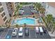 A refreshing community pool with ample seating and nearby parking, perfect for relaxation and convenience at 7601 N Ocean Blvd. # 7-C, Myrtle Beach, SC 29572