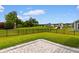 Fenced backyard with a scenic view of the community and beautiful landscaping at 908 Pelagic Loop, Myrtle Beach, SC 29579