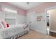 Bedroom featuring a single bed, neutral walls, and a built-in closet with paneled doors at 908 Pelagic Loop, Myrtle Beach, SC 29579