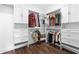 Bright walk-in closet featuring custom shelving, drawers, and ample hanging space for organized storage at 908 Pelagic Loop, Myrtle Beach, SC 29579