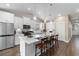 Bright, spacious kitchen with stainless appliances, a central island, and bar seating, ideal for entertaining at 908 Pelagic Loop, Myrtle Beach, SC 29579