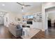 Spacious living room features built-in shelving, fireplace, hardwood floors, and comfortable seating at 908 Pelagic Loop, Myrtle Beach, SC 29579