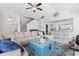 Bright living room featuring vaulted ceiling, comfortable seating, and seamless flow to the kitchen bar at 914 Mary Read Dr., North Myrtle Beach, SC 29582