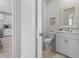 Elegant powder room features a stylish mirror, vanity with storage, and contemporary fixtures at 914 Mary Read Dr., North Myrtle Beach, SC 29582