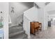 Inviting staircase with carpeted steps, leading to an upstairs area with natural lighting at 914 Mary Read Dr., North Myrtle Beach, SC 29582