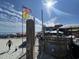 Beach view with umbrellas and a beachfront restaurant at 9550 Shore Dr. # 1733, Myrtle Beach, SC 29579