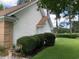 Charming home exterior with brick accents, white siding, and well-manicured landscaping at 9614 Indigo Creek Blvd., Murrells Inlet, SC 29576