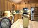 Modern kitchen with granite countertops, stainless appliances, and ample cabinet space at 9614 Indigo Creek Blvd., Murrells Inlet, SC 29576