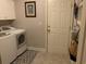 Spacious laundry room with washer, dryer, and cabinet storage at 9614 Indigo Creek Blvd., Murrells Inlet, SC 29576