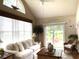 Comfortable living room with abundant natural light and a view of the backyard at 9614 Indigo Creek Blvd., Murrells Inlet, SC 29576