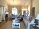 Spacious living room with dining area, featuring ample natural light and elegant decor at 9614 Indigo Creek Blvd., Murrells Inlet, SC 29576